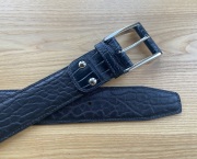 An elephant and crocodile leather belt