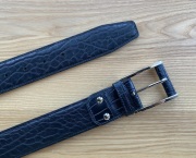 An elephant and crocodile leather belt